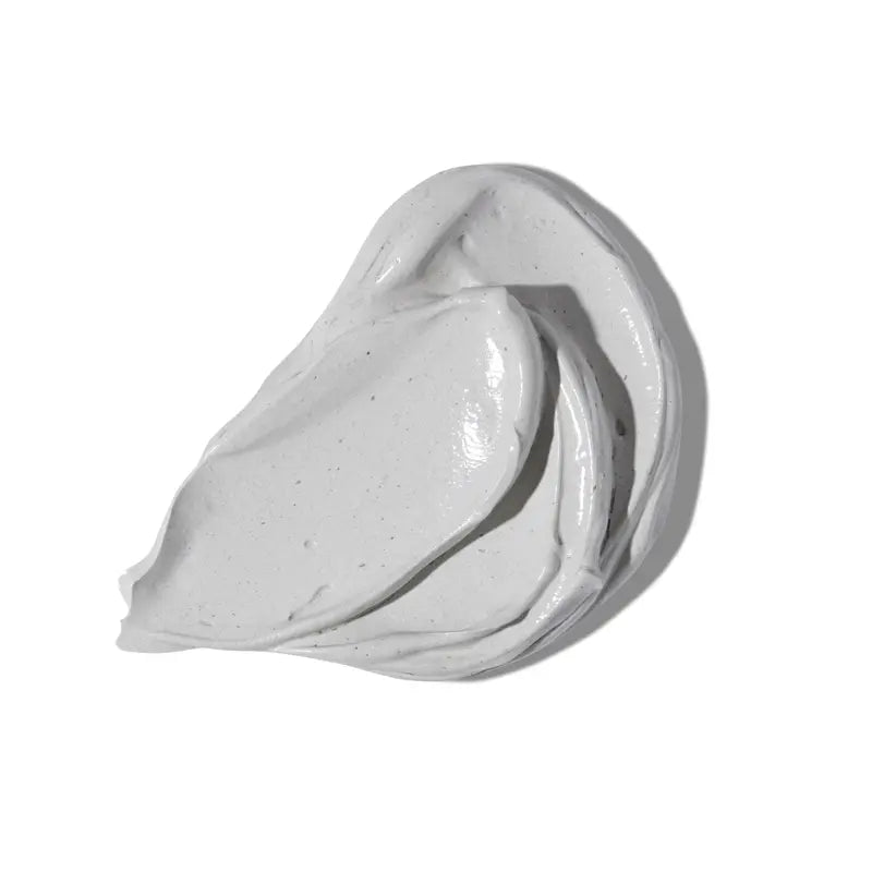 White cream or paste on a white background